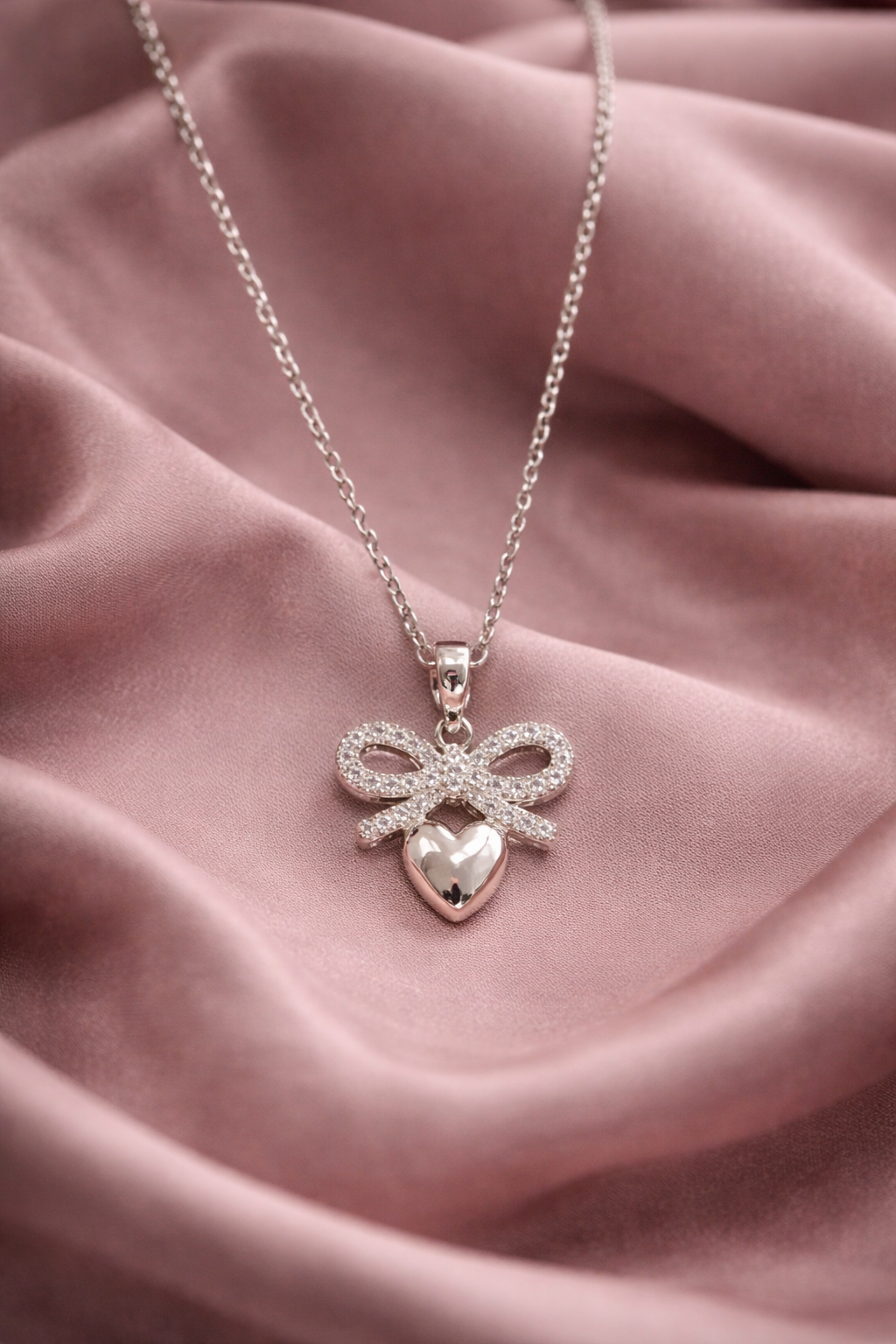 Gleaming Bow with Heart Silver Pendant Necklace